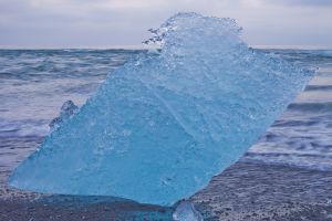 An iceberg on the shores of Mýrabugur⁩.