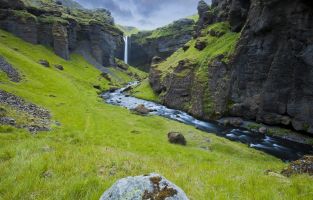A hidden waterfall near â€Žâ¨RangaÌrÃ¾ing eystraâ©, â¨South Icelandâ©